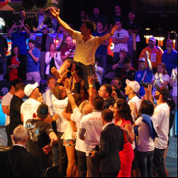 Esfandiari is hoisted in the air by friends and family after clinching the Big One for One drop title.